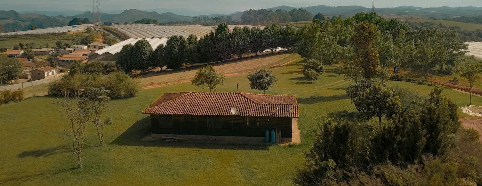 Cinematic frame from Fazenda Alpes institutional film by ORB Audiovisual